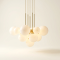 Ziegfeld — Lustre cascade globes opalin & laiton doré